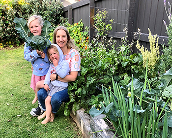 Gemma growing veges with Marley & Lottie
