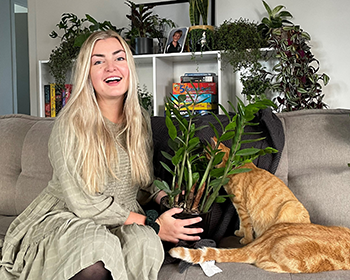 Hannah at home with her plant babies